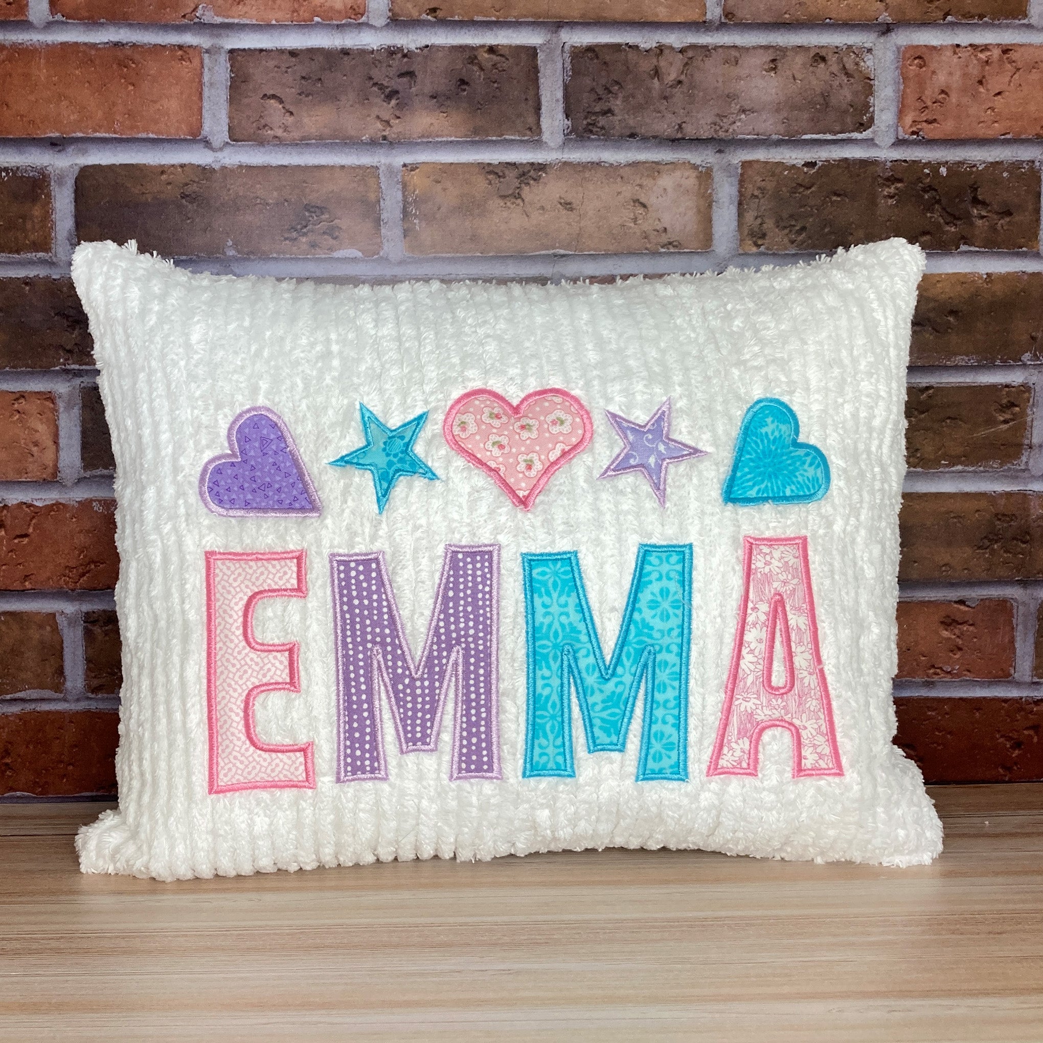 personalized name pillow for girl- multiple pastel colored applique name and hearts and stars