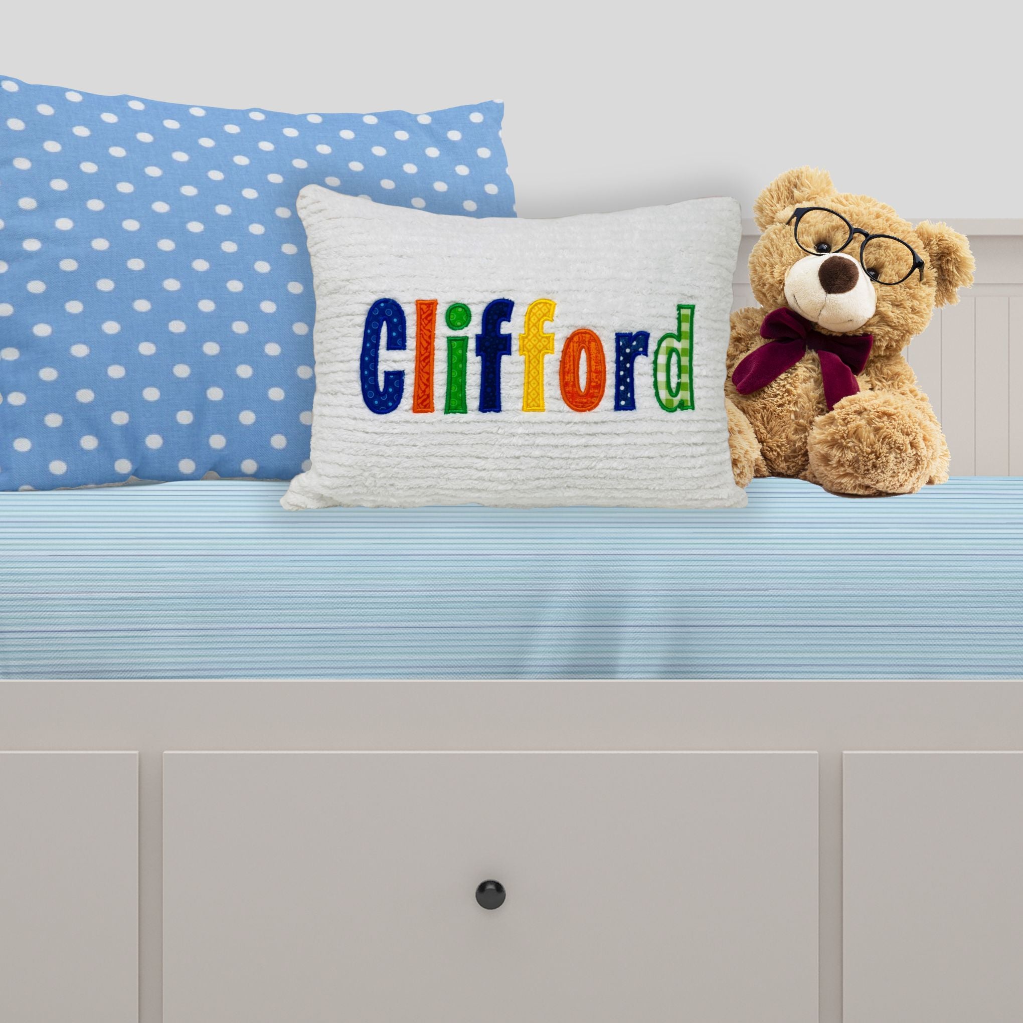 Chenille name pillow with colorful applique letters 