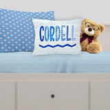 Adorable bule chenille pillow with applique name in blue prints. Kids love personalized items.
