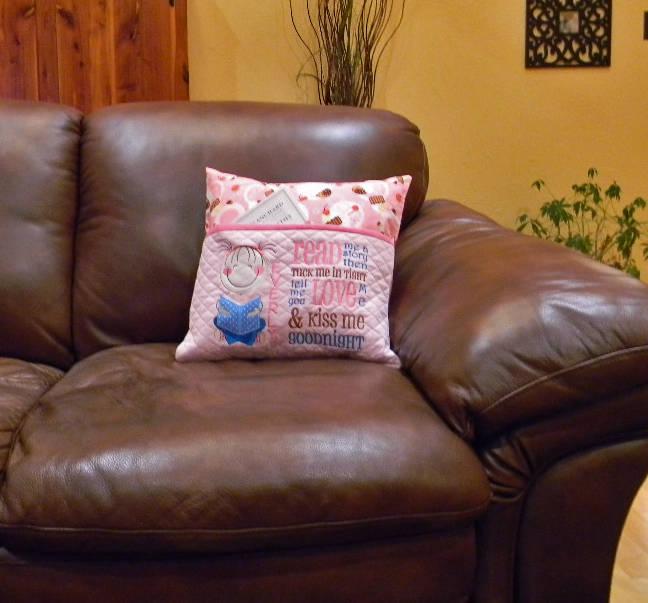 Girl reading pillow with embroidered pocket