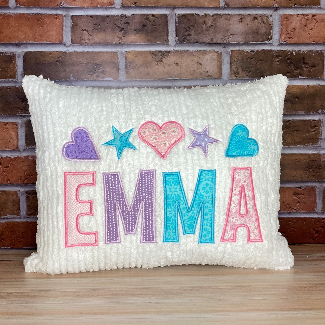 personalized name pillow for girl-  multiple pastel colored applique name  and hearts and stars