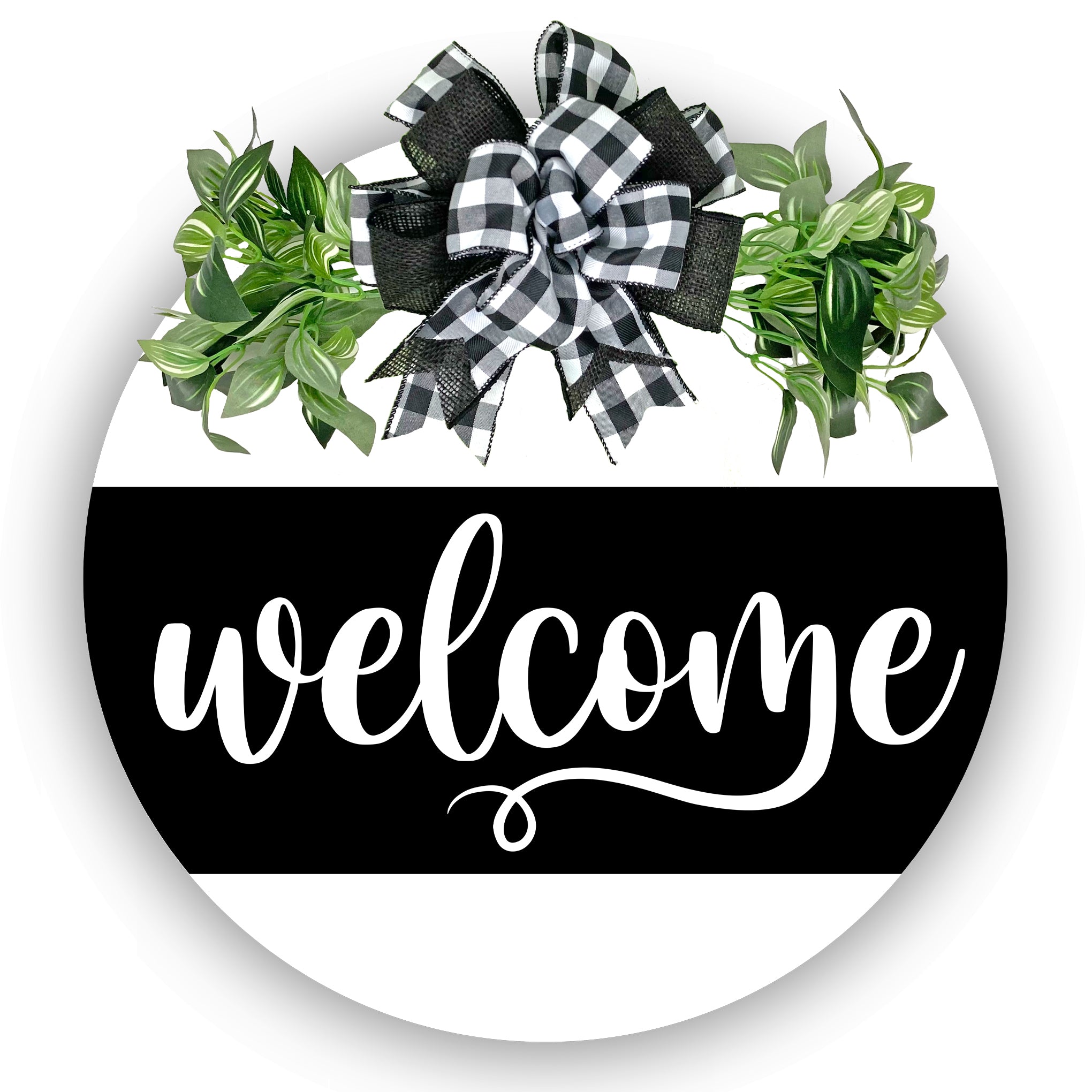 Painted 18 inch wood round door hanger.  white background with welcome text on a large black stripe.  black and white plaid bow with greenery.