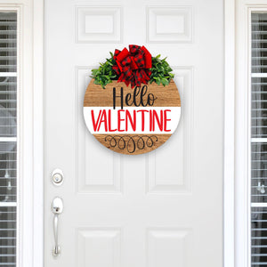 stained wood wreath with Hello Valentine Sprint and flowers. red and black plaid with red bow and greenery. 18 inches round solid wood
