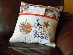Beach reading pillow, with embroidered pocket